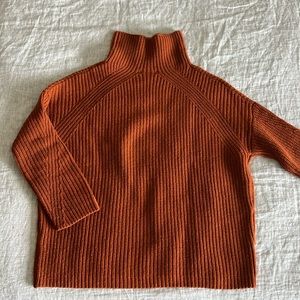 Oversized rust orange roll neck
